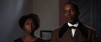 Movie still from “Harriet” (2019), directed by Kasi Lemmons – A man and a woman standing next to each other; Close Up shot, Over the shoulder angle