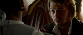 Movie still from “Harriet” (2019), directed by Kasi Lemmons – A person sitting in a chair; Close Up shot, Over the shoulder angle