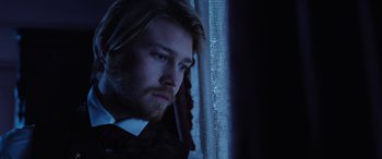 Movie still from “Harriet” (2019), directed by Kasi Lemmons – A person wearing a suit and tie; Close Up shot, Low angle