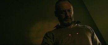 Movie still from “Harry Brown” (2009), directed by Daniel Barber – A person wearing a jacket; Close Up shot, Low angle