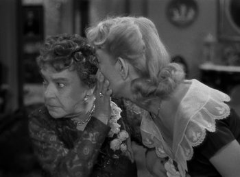 Movie still from “Harvey” (1950), directed by Henry Koster – Two women talking to each other in a room; Close Up shot, Over the shoulder angle