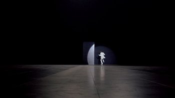 Movie still from “Head” (1968), directed by Bob Rafelson – A person walking on a hard surface floor; Extreme Wide shot, Low angle
