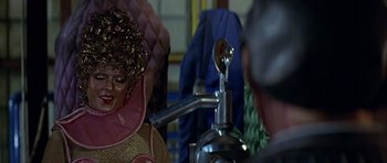 Movie still from “Heartbeeps” (1981), directed by Allan Arkush – A spoon on the handle of a faucet; Close Up shot, Over the shoulder angle