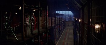 Movie still from “Heartbeeps” (1981), directed by Allan Arkush – A room filled with lots and lots of clothes; Extreme Wide shot, High angle
