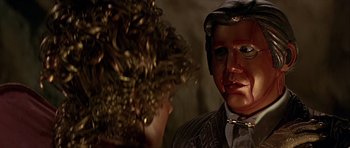 Movie still from “Heartbeeps” (1981), directed by Allan Arkush – A man's face in a mask; Close Up shot, Over the shoulder angle