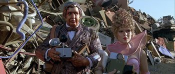 Movie still from “Heartbeeps” (1981), directed by Allan Arkush – A man and a woman dressed in costumes; Medium shot, Low angle