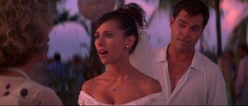 Movie still from “Heartbreakers” (2001), directed by David Mirkin – A woman in a wedding dress and a veil; Close Up shot, Over the shoulder angle