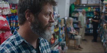 Movie still from “Hearts Beat Loud” (2018), directed by Brett Haley – A man with a long beard is sitting in front of a woman; Medium shot, Over the shoulder angle