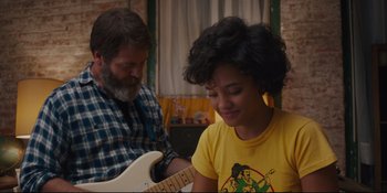Movie still from “Hearts Beat Loud” (2018), directed by Brett Haley – A man and a woman are playing a guitar together; Medium shot, Over the shoulder angle