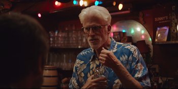 Movie still from “Hearts Beat Loud” (2018), directed by Brett Haley – An older man holding a wine glass in his hand; Close Up shot, Over the shoulder angle