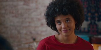 Movie still from “Hearts Beat Loud” (2018), directed by Brett Haley – A person wearing a red shirt; Close Up shot, Over the shoulder angle