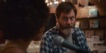 Movie still from “Hearts Beat Loud” (2018), directed by Brett Haley – A man sitting in front of a microphone in front of another man; Close Up shot, Over the shoulder angle