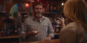 Movie still from “Hearts Beat Loud” (2018), directed by Brett Haley – A man and a woman at a bar holding wine glasses; Medium shot, Over the shoulder angle