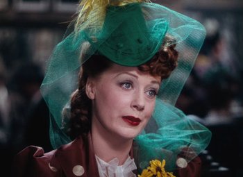 Movie still from “Hello Frisco, Hello” (1943), directed by H. Bruce Humberstone – A person wearing a hat; Close Up shot, Low angle