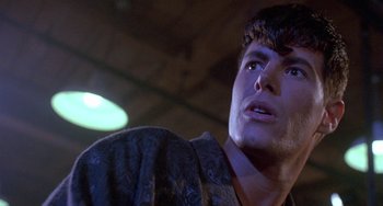 Movie still from “Hellraiser III: Hell on Earth” (1992), directed by Anthony Hickox – A person looking up at the sky; Close Up shot, Over the shoulder angle