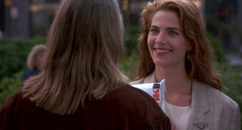 Movie still from “Hellraiser III: Hell on Earth” (1992), directed by Anthony Hickox – Two women talking to each other in a park setting; Close Up shot, Over the shoulder angle