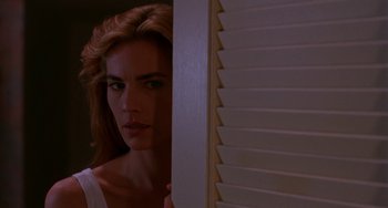 Movie still from “Hellraiser III: Hell on Earth” (1992), directed by Anthony Hickox – A person looking through a window; Close Up shot, Over the shoulder angle