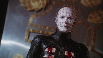 Movie still from “Hellraiser: Bloodline” (1996), directed by Kevin Yagher – A man with a pinhead mask and blood on his face; Close Up shot, Low angle
