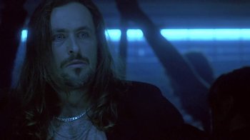 Movie still from “Hellraiser: Deader” (2005), directed by Rick Bota – A person with long hair; Close Up shot, Low angle