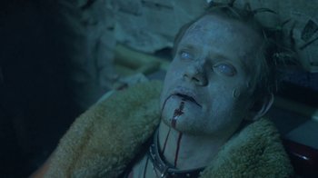 Movie still from “Hellraiser: Deader” (2005), directed by Rick Bota – A person with blood on his face; Close Up shot, Low angle