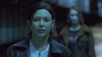 Movie still from “Hellraiser: Deader” (2005), directed by Rick Bota – A person wearing a leather jacket; Close Up shot, Low angle