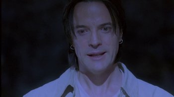 Movie still from “Hellraiser: Deader” (2005), directed by Rick Bota – A person with long hair; Close Up shot, High angle