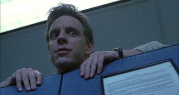 Movie still from “Hellraiser: Hellseeker” (2002), directed by Rick Bota – A person holding a computer screen; Close Up shot, Low angle