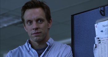 Movie still from “Hellraiser: Hellseeker” (2002), directed by Rick Bota – A person sitting in a chair; Close Up shot, Over the shoulder angle