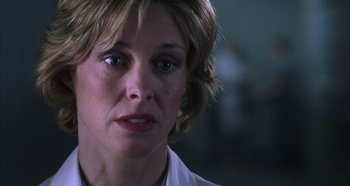 Movie still from “Hellraiser: Hellseeker” (2002), directed by Rick Bota – A person wearing a white shirt; Close Up shot, Low angle