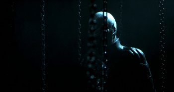 Movie still from “Hellraiser: Hellseeker” (2002), directed by Rick Bota – A man with a bald head is standing in a dark room; Close Up shot, Low angle