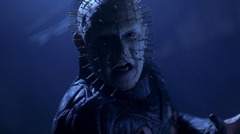 Movie still from “Hellraiser: Hellworld” (2005), directed by Rick Bota – A person with a pinhead mask; Close Up shot, Low angle