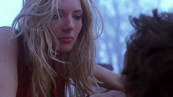 Movie still from “Hellraiser: Hellworld” (2005), directed by Rick Bota – A person with long blonde hair; Close Up shot, Low angle