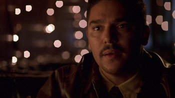 Movie still from “Hellraiser: Inferno” (2000), directed by Scott Derrickson – A person wearing a tie; Close Up shot, Low angle