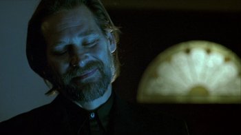 Movie still from “Hellraiser: Inferno” (2000), directed by Scott Derrickson – A man with his eyes closed in a dark room; Close Up shot, Low angle