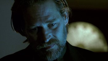 Movie still from “Hellraiser: Inferno” (2000), directed by Scott Derrickson – A person with a beard; Close Up shot, Low angle