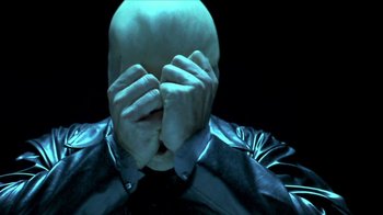 Movie still from “Hellraiser: Inferno” (2000), directed by Scott Derrickson – A bald man covering his eyes with his hands; Close Up shot, High angle