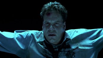 Movie still from “Hellraiser: Inferno” (2000), directed by Scott Derrickson – A person with a head injury; Close Up shot, Low angle