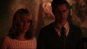 Movie still from “Hellraiser: Judgment” (2018), directed by Gary J. Tunnicliffe – A man and a woman standing next to each other; Close Up shot, Over the shoulder angle