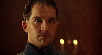 Movie still from “Henry V” (1989), directed by Kenneth Branagh – A person wearing a shirt; Close Up shot, Low angle