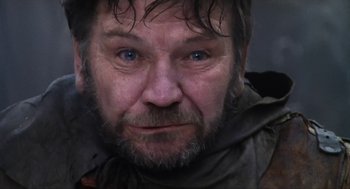 Movie still from “Henry V” (1989), directed by Kenneth Branagh – A person with a beard; Close Up shot, Low angle