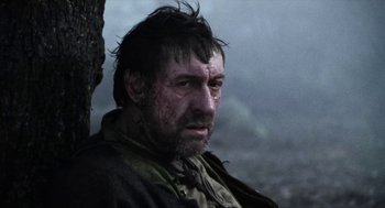 Movie still from “Henry V” (1989), directed by Kenneth Branagh – A person wearing a jacket; Close Up shot, Over the shoulder angle