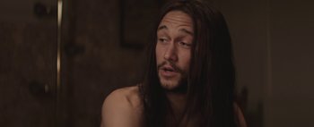 Movie still from “Hesher” (2010), directed by Spencer Susser – A person with long hair; Close Up shot, High angle