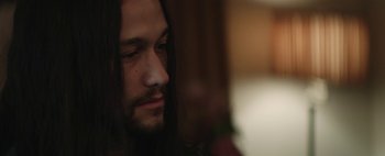 Movie still from “Hesher” (2010), directed by Spencer Susser – A person with long hair; Close Up shot, Low angle