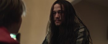 Movie still from “Hesher” (2010), directed by Spencer Susser – A person with long hair; Close Up shot, Low angle