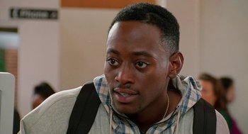 Movie still from “Higher Learning” (1995), directed by John Singleton – A person wearing a jacket; Close Up shot, Over the shoulder angle