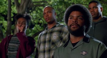 Movie still from “Higher Learning” (1995), directed by John Singleton – A group of people standing next to each other; Medium shot, Low angle