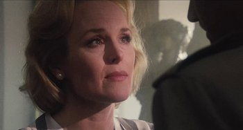 Movie still from “Highlander” (1986), directed by Russell Mulcahy – A person looking at the camera; Close Up shot, Over the shoulder angle