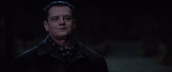 Movie still from “Hoffa” (1992), directed by Danny DeVito – A person wearing a jacket; Close Up shot, Low angle