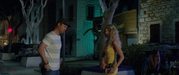 Movie still from “Holiday” (2018), directed by Isabella Eklöf – A man and a woman standing next to each other; Medium shot, Over the shoulder angle