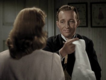 Movie still from “Holiday Inn” (1942), directed by Robert Allen – A man and a woman are looking at each other; Close Up shot, Over the shoulder angle